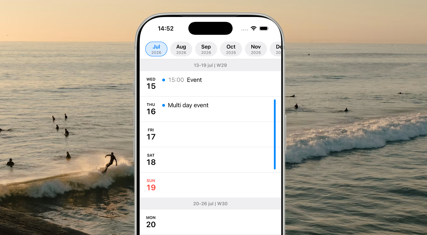 Daymo agenda displayed on an iPhone beside the ocean